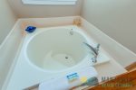 Japanese soaking tub in downstairs bathroom 